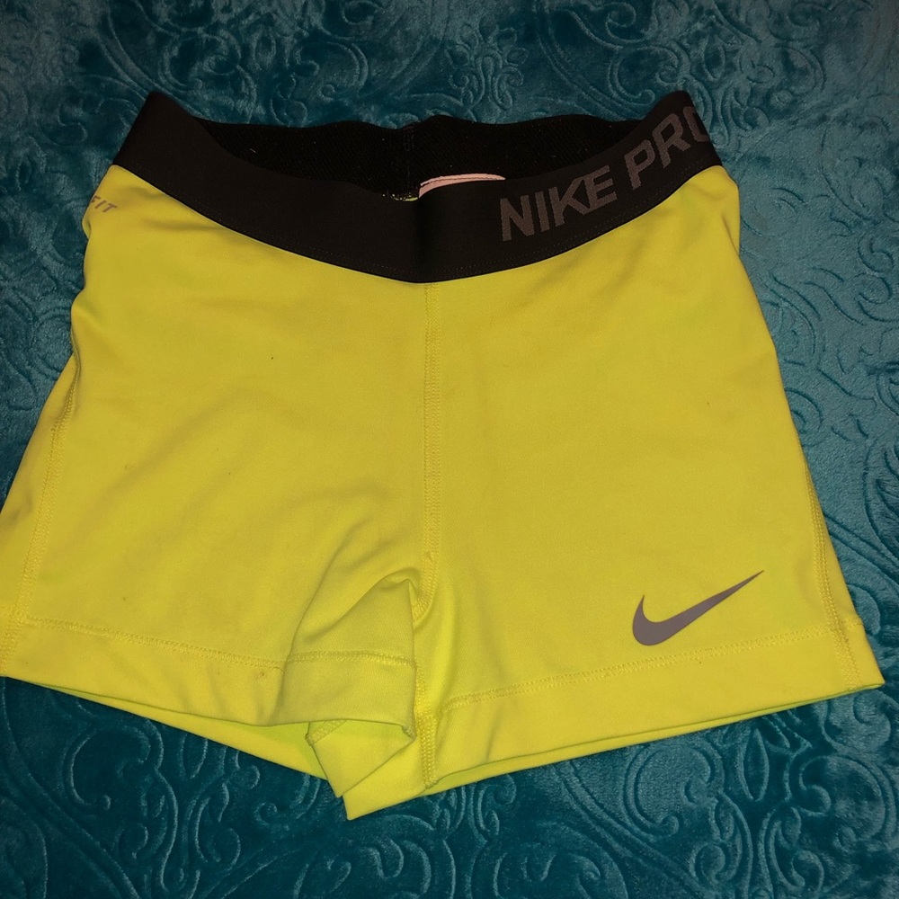 Nike yellow compression shorts size xs